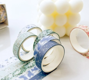 Floral washi tape set featuring botanical patterns in indigo, mint, and cream tones