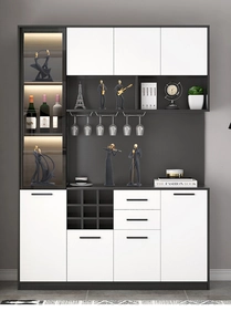 Close-up of modern white and dark grey sideboard featuring glass display and wine rack