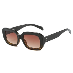 Retro square sunglasses with two-tone frame, gradient lenses and rivet details