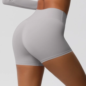 Detail of high-waisted seamless light grey yoga shorts with peach butt lift effect