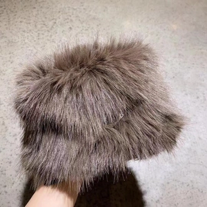 Close-up of thick faux fur material and soft plush texture on the winter bucket hat