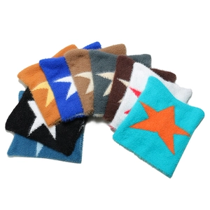Fuzzy knit cat ear beanie with star patterns in various vibrant colors on white background