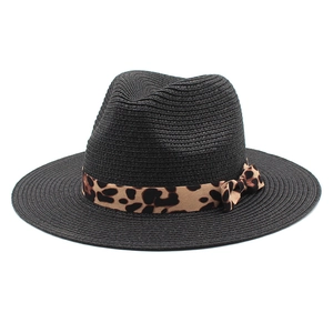Elegant black straw Panama hat with a leopard print ribbon and small bow decoration