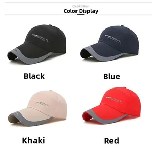 Detail view of four outdoor baseball caps in black, navy, khaki, and red with contrast brim
