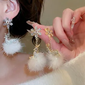 Elegant Christmas snowflake deer earrings with white fur balls in gold and silver plating