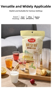 Detailed view of 90ml thick clear plastic tasting cups on a premium wooden tray