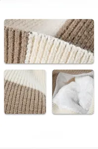 Detailed view of winter knitted hat with thick faux fur lining for warmth and soft texture