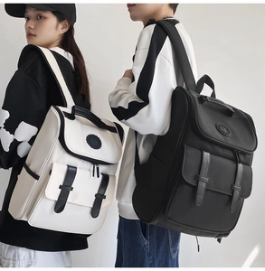 Back view of models wearing large capacity casual backpacks in beige and black colors