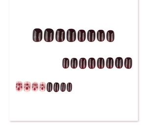 Detail view of 24pcs press-on nails in burgundy and floral design with beads