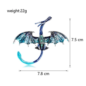 Detail view of enamel dragon brooch with measurements 7.5cm by 7.8cm and 22g weight