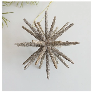 Close-up of champagne gold star ornament with glitter texture for Christmas tree decor