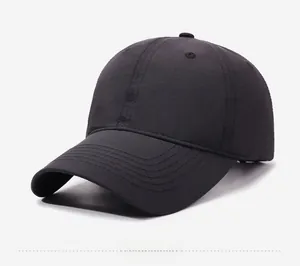 Detailed side profile of a classic black baseball cap with reinforced stitched brim