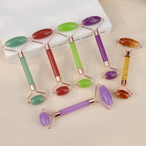 Set of facial massage rollers in six natural stones with rose gold metal frames