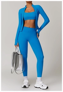 Detailed view of women's bright blue zipper yoga jacket and matching fitness set