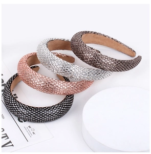 Detail of four rhinestone sponge headbands in black, rose gold, silver and bronze