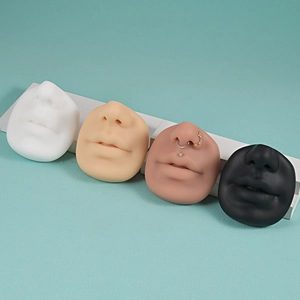 Silicone nose and mouth piercing model in four skin tones for jewelry display