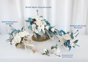 Detail of bridal bouquet set with white roses, blue berries and burlap ribbon wrap
