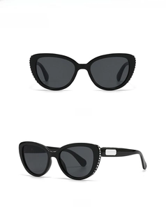 Front and 45-degree angle views of black cat eye sunglasses with rhinestone accents