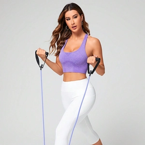Women's purple high-impact seamless sports bra and white yoga leggings fitness set