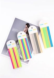 Close-up of colorful PET sticky notes on a magazine, showing vibrant and Morandi colors