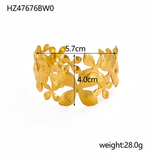 Detail showing dimensions of 18K gold plated floral cuff with textured flower patterns