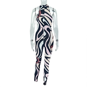 Detailed back view of a slim-fit halter jumpsuit with vibrant pink wave patterns