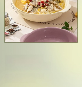 Macro detail of large cream ceramic soup bowl with handles and subtle 3D texture