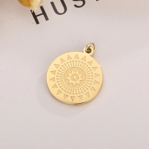 Golden stainless steel sun totem pendant with bohemian geometric engraving and closed ring
