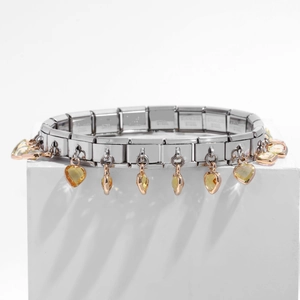 Detail of Italian style stainless steel modular bracelet with yellow heart crystal charms