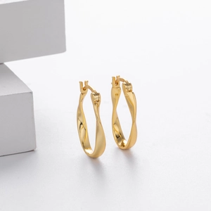 Detailed close-up showing the S925 hallmark on gold plated twisted Mobius hoop earrings