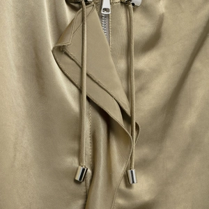Short satin jacket in champagne gold with metal zipper and adjustable drawstring details