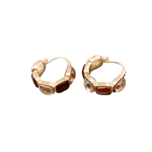 Vintage square gold-tone hoop earrings featuring amber crystal accents on a white background
