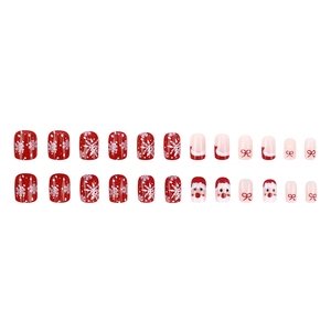 Christmas press-on nail kit featuring Santa Claus patterns and festive red bows with snowflakes