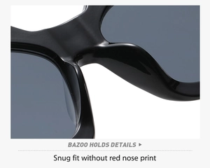 Detail view of smooth nose pads on black retro sunglasses for snug fit and comfort