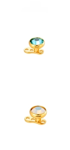 Close-up of G23 titanium dermal anchor tops with blue and iridescent zircon stones