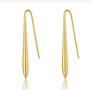 Detailed macro view of 18K gold-plated teardrop earrings with a sleek streamlined design