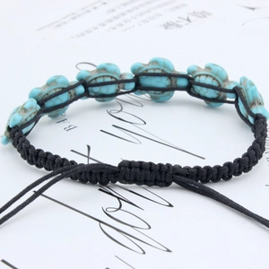 Handmade woven turtle bracelet with turquoise style beads and adjustable black nylon cord