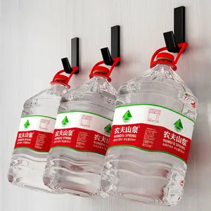 Strong adhesive wall hooks set showing high weight capacity with water bottles