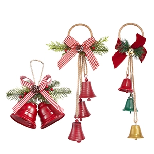 Vintage Christmas bells with jute rope, pine needles and festive plaid bows on white background