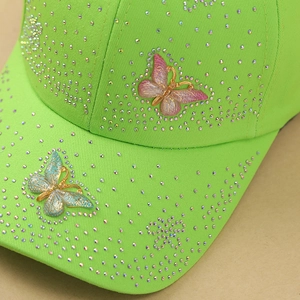 Neon green baseball cap with sparkling rhinestones and 3D butterfly ornaments for sun protection