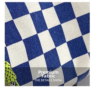 Macro view of blue and white checkerboard canvas texture with neon braided rope detail