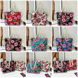 Ethnic style floral canvas tote bag with thick rope straps in multiple vibrant colors