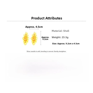 Detail view of yellow shell tassel earrings showing dimensions 9.2cm height and 4.5cm width