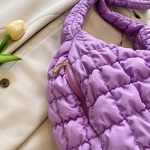 Chic purple quilted puffer tote bag with square pattern and smooth zip closure