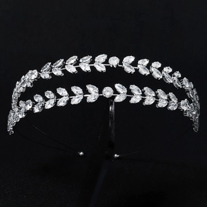 Elegant silver vine leaf tiara headband with sparkling cubic zirconia on black background