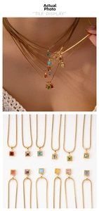 Detailed tile display of gold box chain necklaces with multi-color zircon pendants