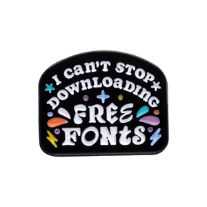 Cartoon geometric black alloy brooch with 'I CAN'T STOP DOWNLOADING FREE FONTS' text