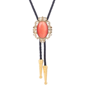 Detailed close-up of crown bolo tie with orange stone and braided black leather cord