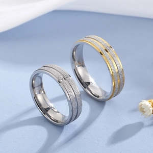 Matte stainless steel rings with brushed finish and silver gold contrast for couples