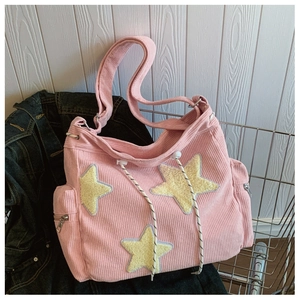 Borsa a tracolla in velluto rosa con stelle di peluche gialle in carrello metallico